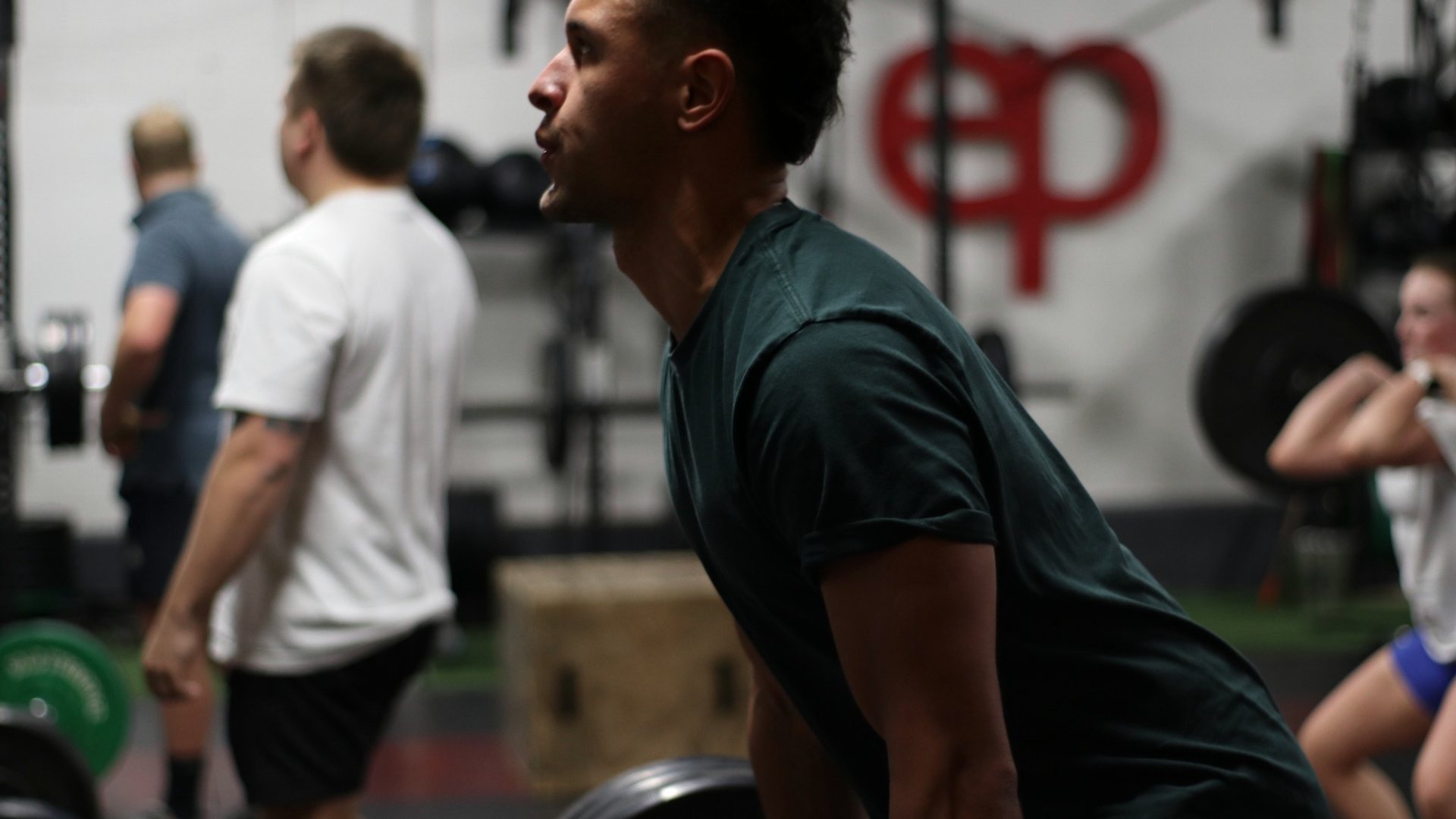 Eaden Project member doing dumbbell strength and conditioning work